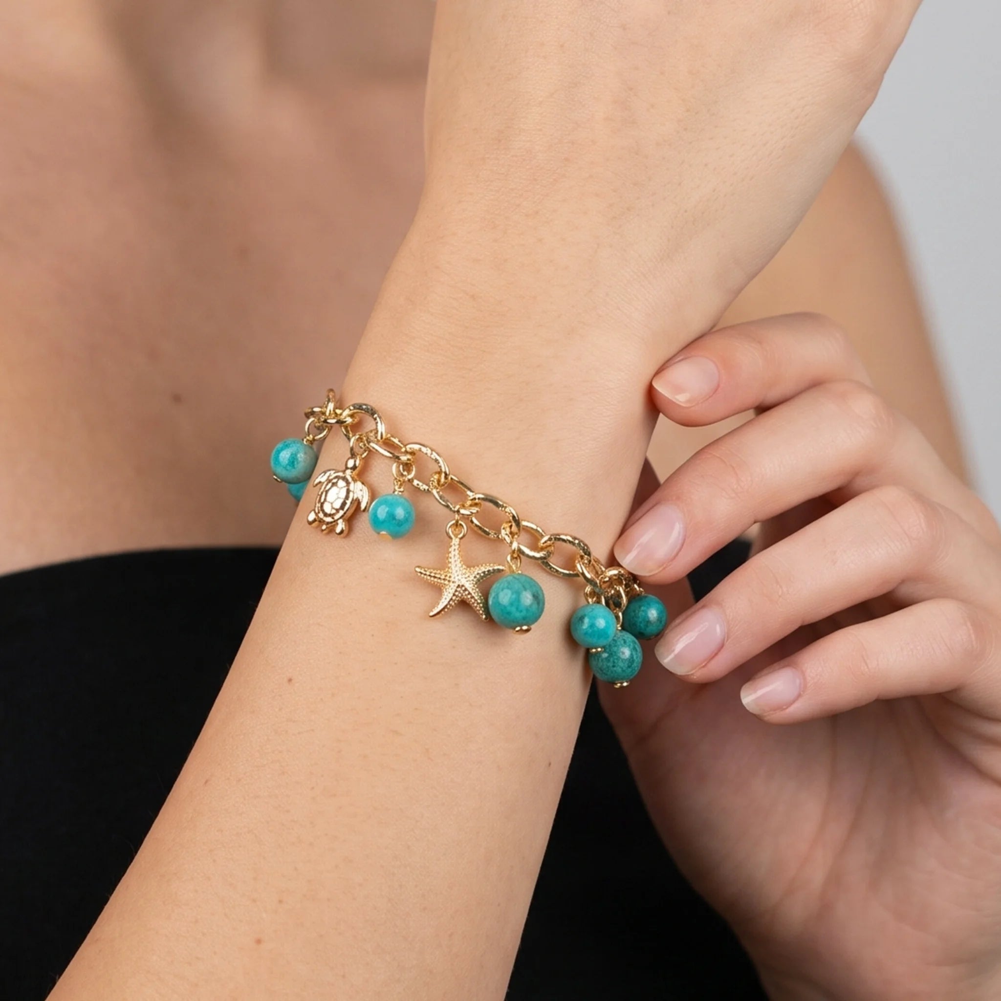 Bracciale in Argento 925 placcato Oro Giallo 18Kt con Charms a Tema Marino e Amazonite