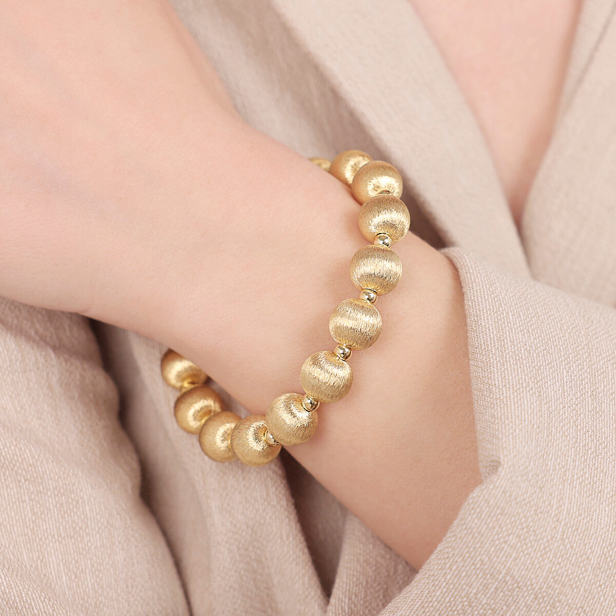 Bracelet in 925 silver 18kt yellow gold plated with satin-finished maxi beads and small polished spheres.