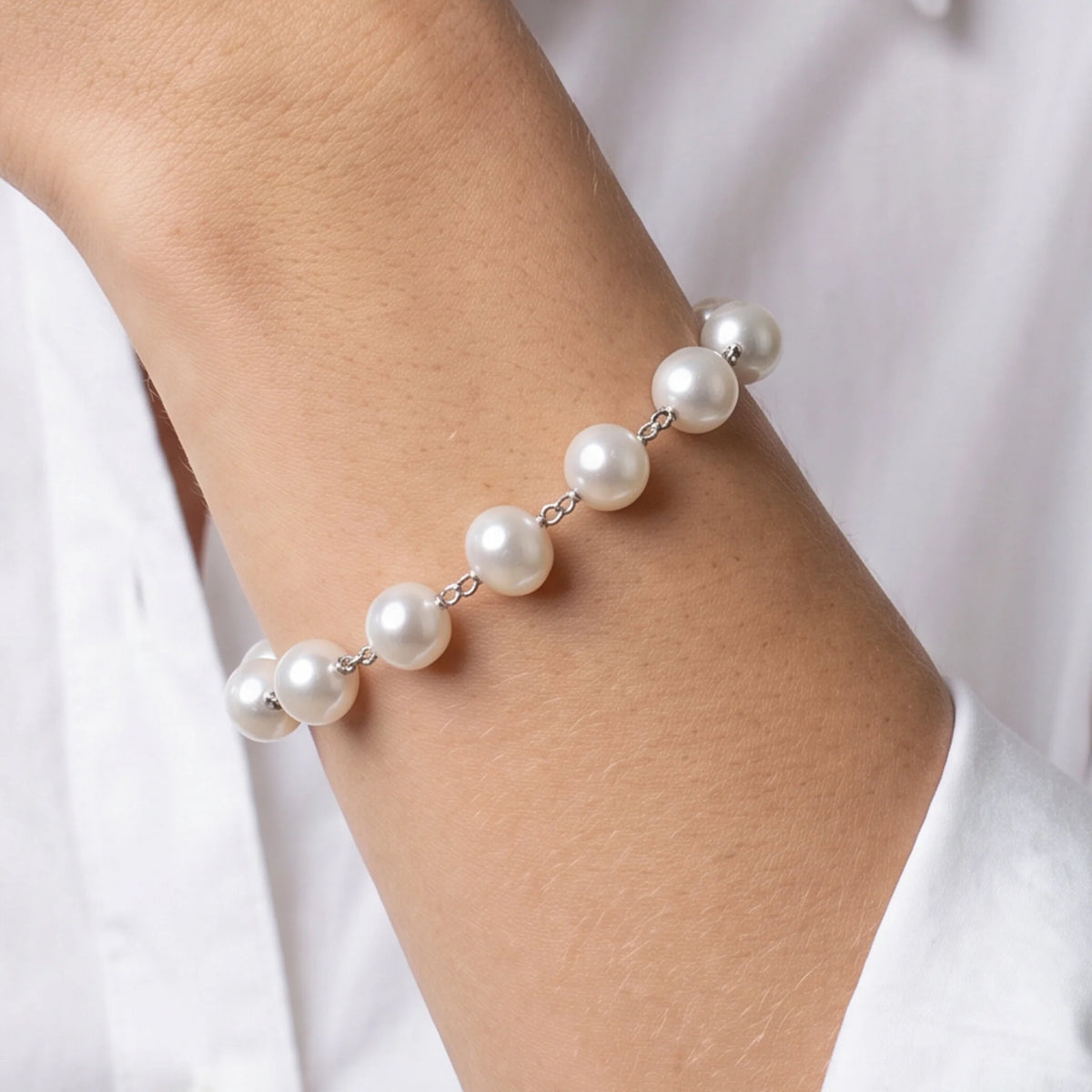 Bracciale in Argento 925 placcato Oro Bianco 18Kt con Perle Ming Bianche d'Acqua Dolce Ø 11/12 mm